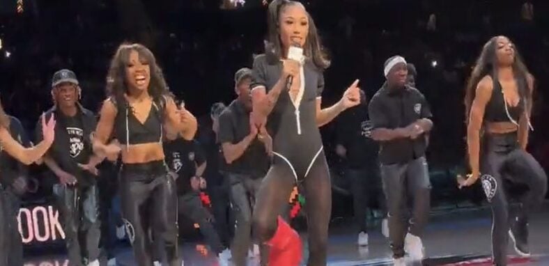 Coi Leray wears MSCHF Big Red Boots during show at Nets game