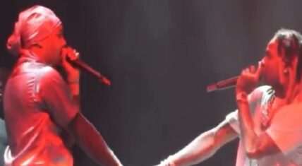 Lil Durk and G Herbo handshake turned to handholding on stage