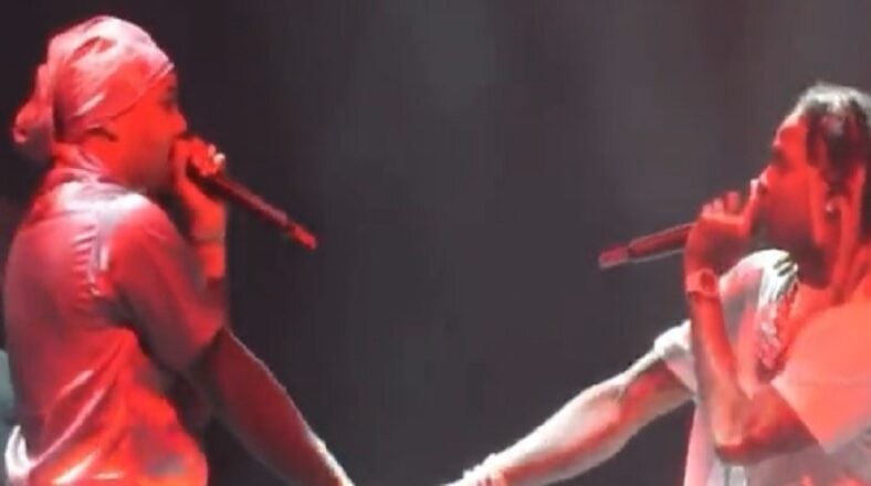 Lil Durk and G Herbo handshake turned to handholding on stage