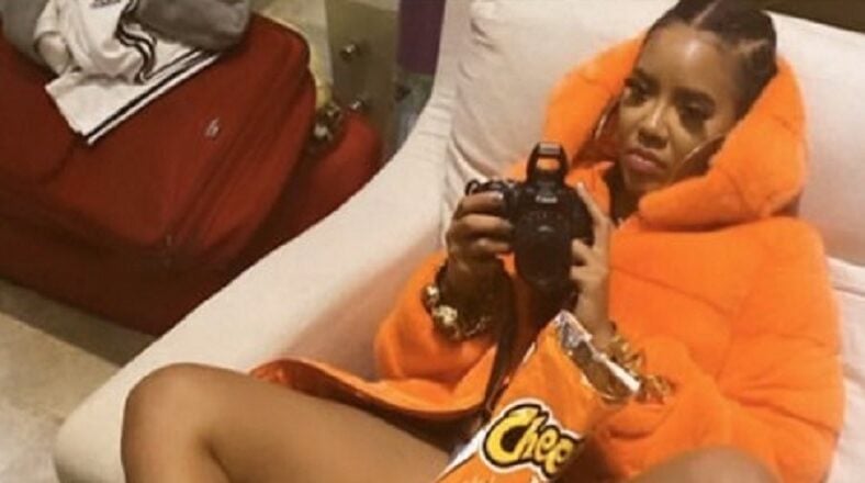 Angela Simmons takes an interesting photo with bag of Cheetos