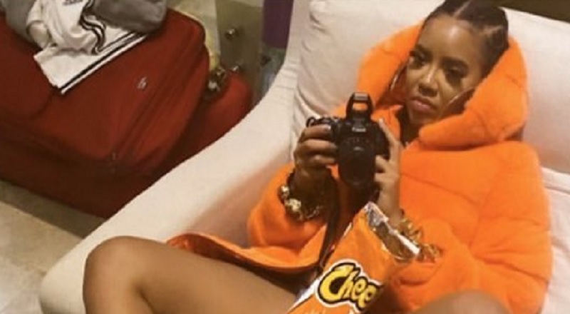Angela Simmons takes an interesting photo with bag of Cheetos