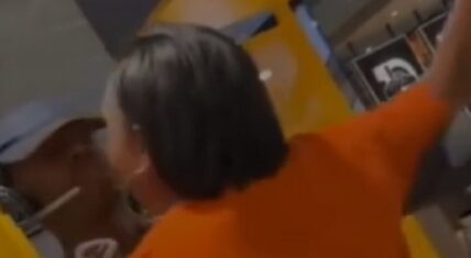 Angry woman spits in McDonalds worker's face