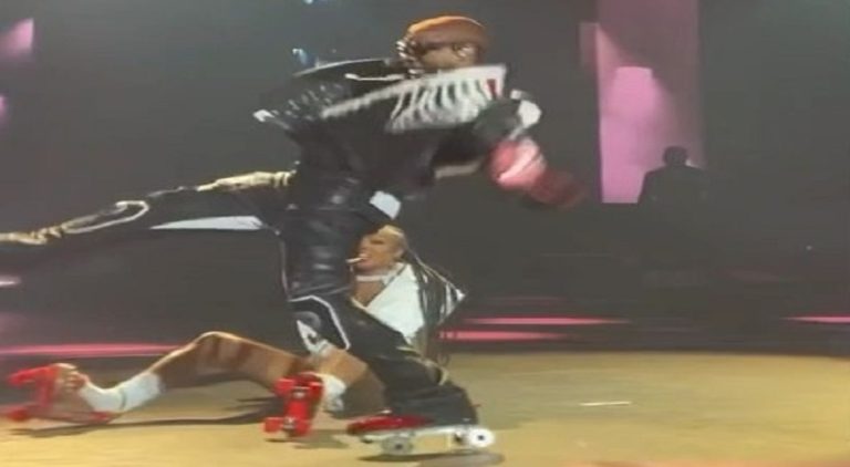 Usher nearly tripped over fan and fell during performance