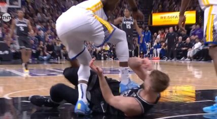 Draymond Green stomps Domantas Sabonis arm for grabbing leg