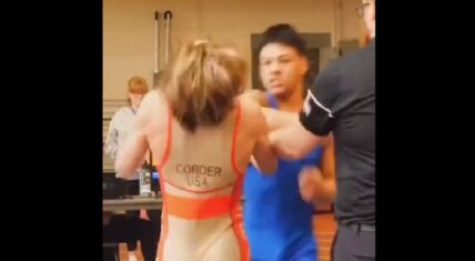 Kid punches wrestling opponent in the face after losing match