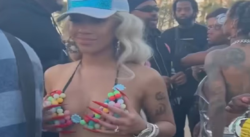 Saweetie spent her first $10K from rap on a boob job
