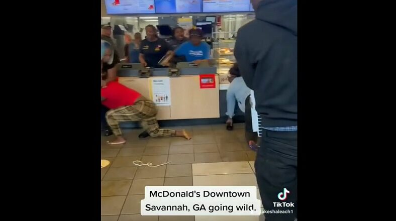 Woman beaten up by McDonalds employees by slipping on tea