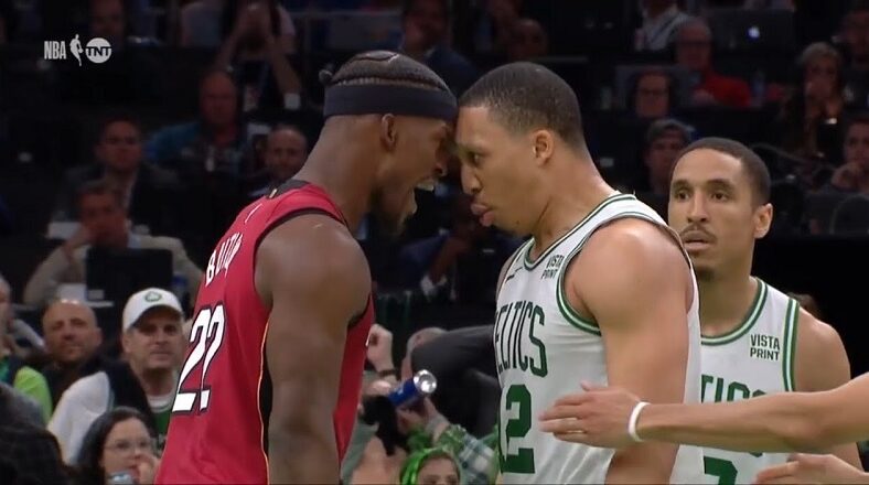 Jimmy Butler and Grant Williams headbutt each other