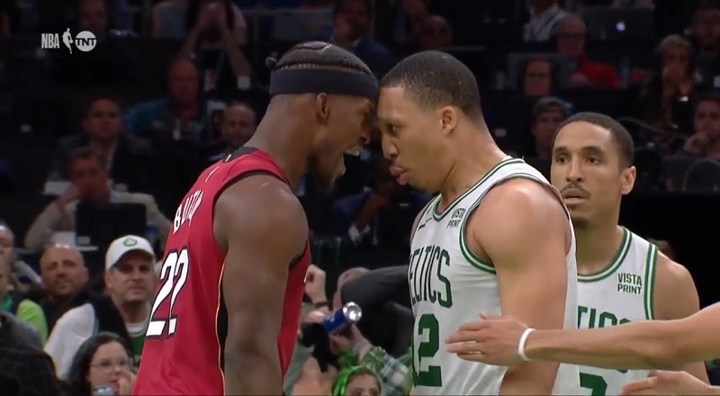 Jimmy Butler and Grant Williams headbutt each other