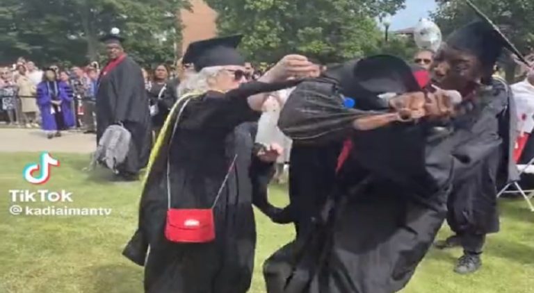 Woman snatches the mic from announcer at her graduation