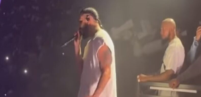 Fan throws phone on stage during Drake's Chicago concert