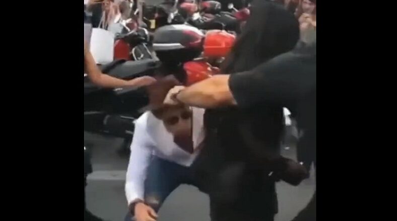Man tries to sniff Kim Kardashian's back side as she walks by