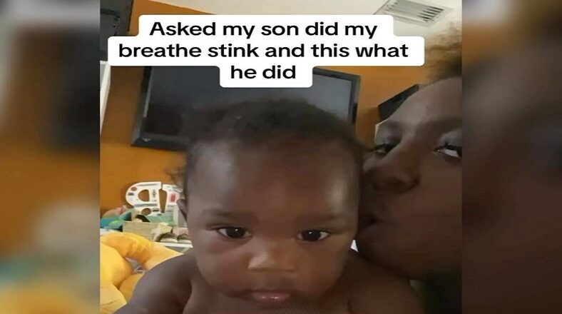 Mom blows breath in toddler's face and he pretends to pass out