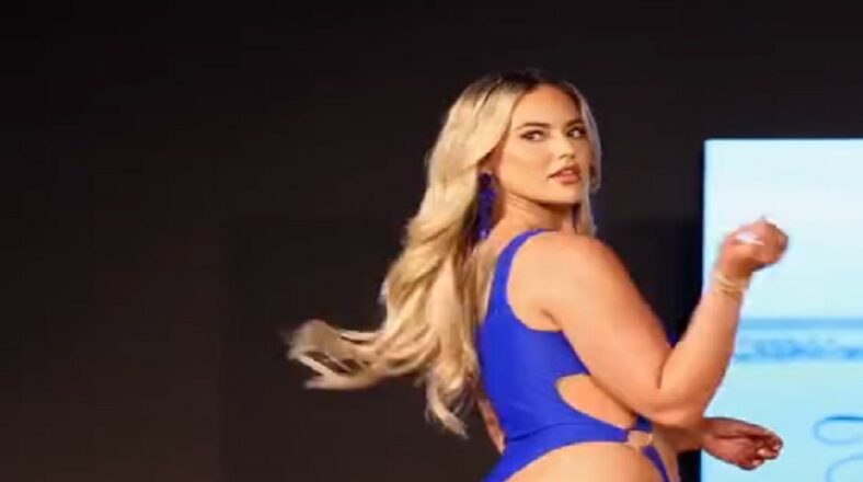 Thick model returns to the runway and shows her back side