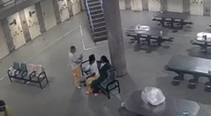 Video shows Lil Jay letting a man sit on his lap in jail
