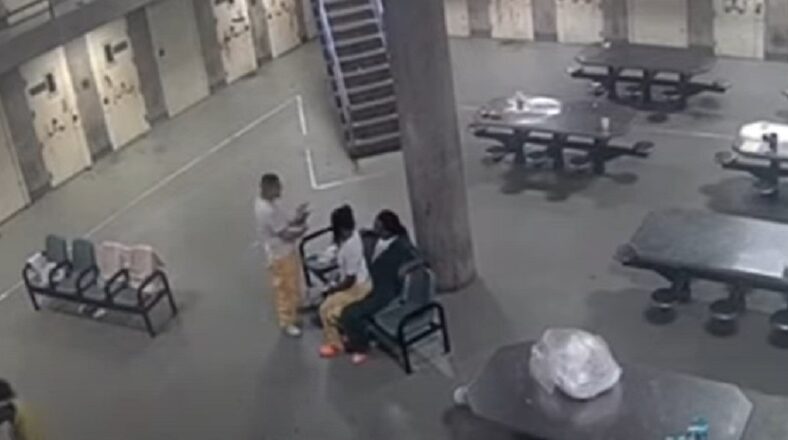 Video shows Lil Jay letting a man sit on his lap in jail