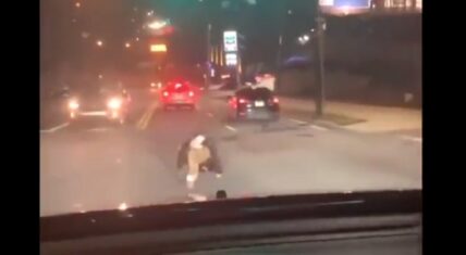 Woman almost gets run over after twerking in the highway