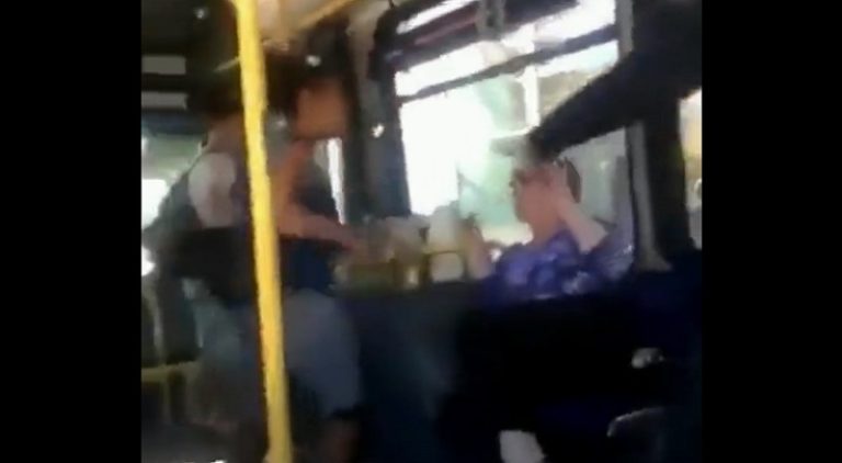 Young woman drags old woman for spitting on her