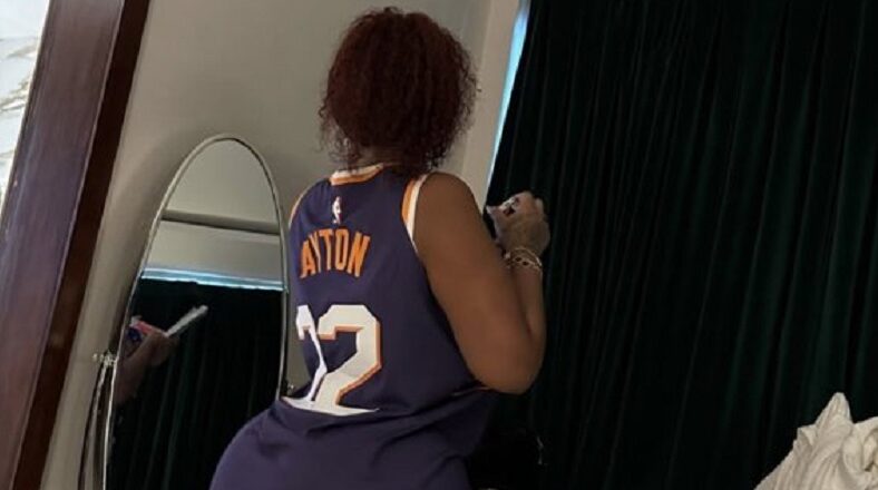 DeAndre Ayton posts woman with large backside wearing his jersey