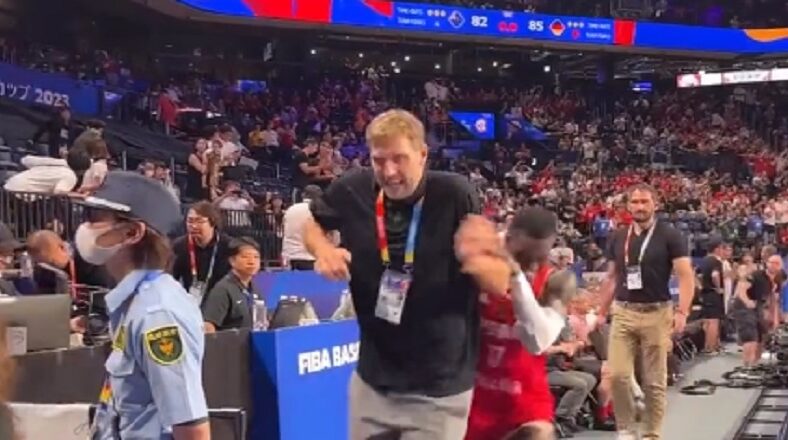Dennis Schröder runs up on Dirk Nowitzki and scares him