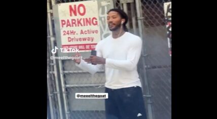 Derrick Rose spotted on side of street talking on the phone