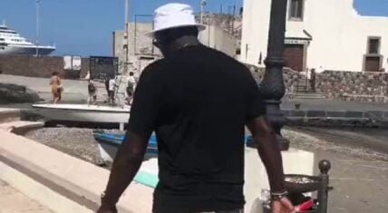 Fans follow Michael Jordan around and make goat noises