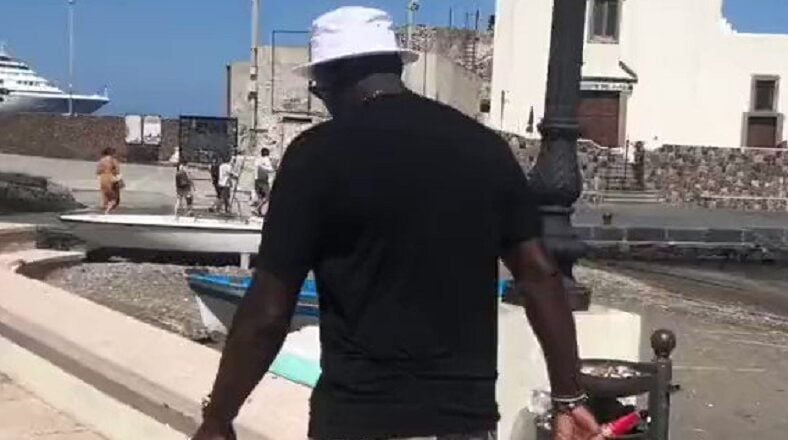 Fans follow Michael Jordan around and make goat noises