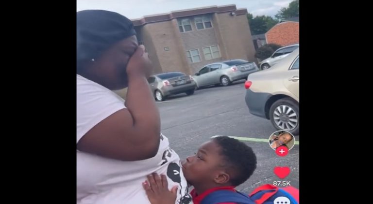 Mother cries while putting son on the bus for the first time
