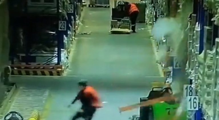 Worker asleep on forklift destroys everything inside warehouse