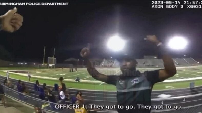 Band director gets tased and arrested for band continuing to play