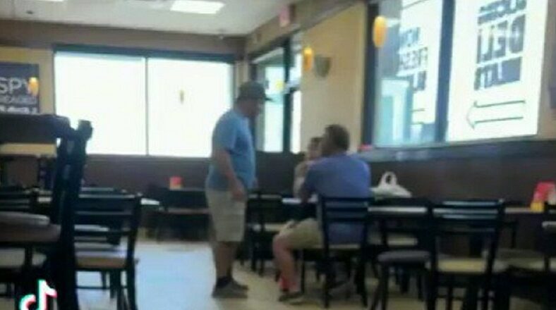 Man catches his father on a date with another woman