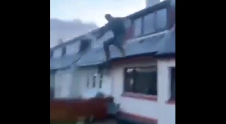 Man jumps off second story roof of house and breaks his ankles
