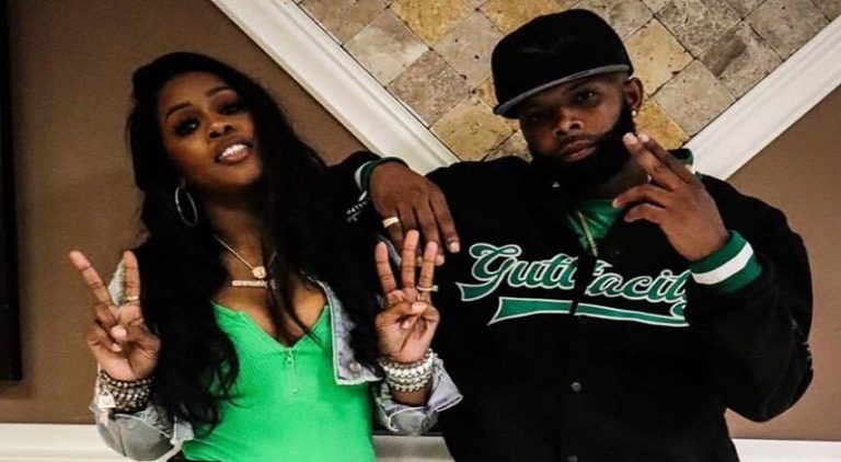Remy Ma and Eazy The Block Captain wear matching outfits