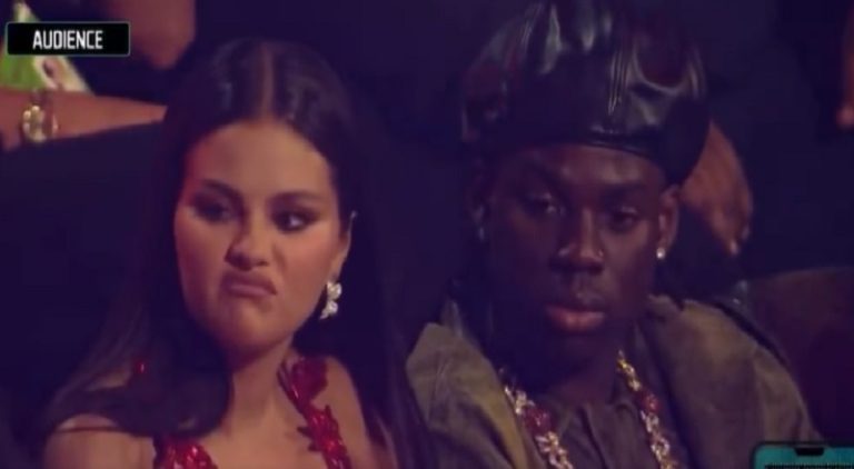 Selena Gomez frowns as Chris Brown is nominated for VMA