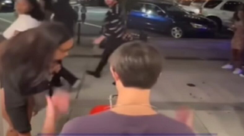 Woman knocks over street performer's piano and robs him