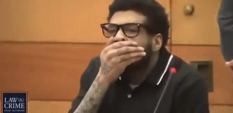 Young Thug's YSL associate displays odd movements at hearing