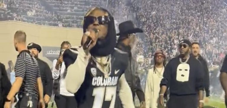 Lil Wayne performs while bringing out Colorado before game