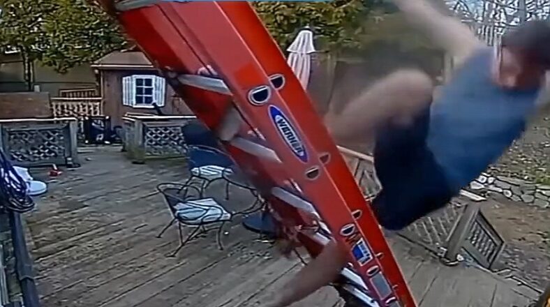 Man falls off the ladder and flat on his face