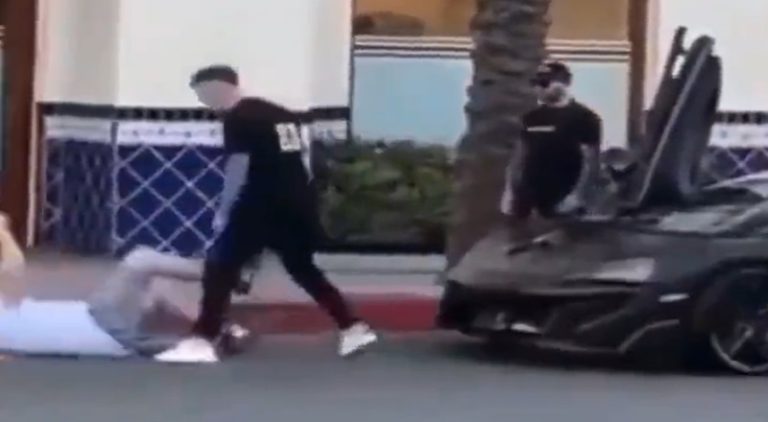 Rich man beats up a guy for sitting on his luxury supercar