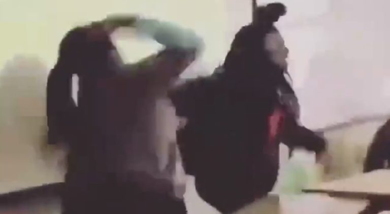 Teacher hits student in the face with belt and beats her
