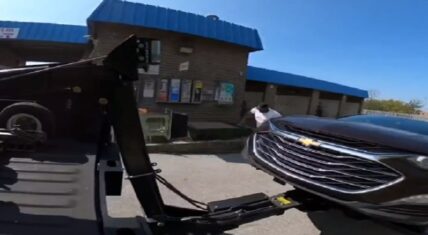 Tow truck driver takes man's car while he's at the carwash
