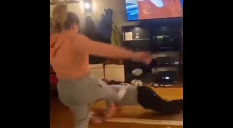 Woman kicks husband playing VR game making him fall off ledge