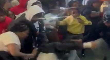 Man fights woman at Lil Durk concert for hitting his mother