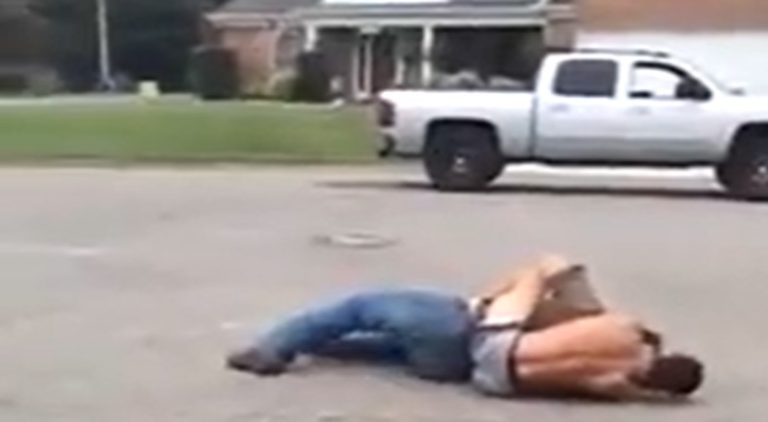 Teenage boy wrestles a grown man to the ground and beats him up