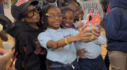 Lola Brooke helps feed 200 NYC children for Thanksgiving