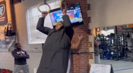 Jadakiss does a full workout with his coat on