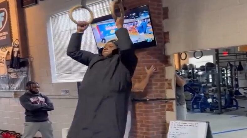 Jadakiss does a full workout with his coat on
