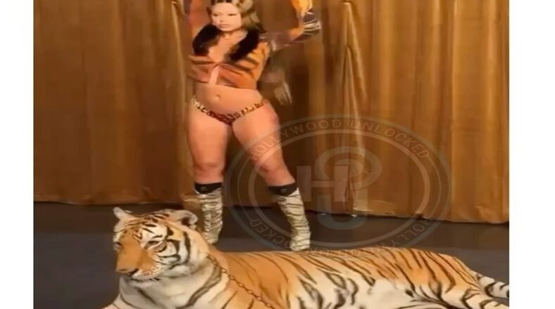 Latto celebrates 25th birthday with photo shoot with live tiger