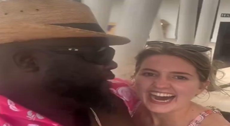 Man pretends to be Rick Ross and takes pic with random woman