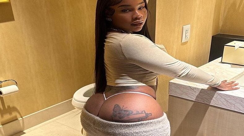 Sukihana shows off her back side with her pants pulled down
